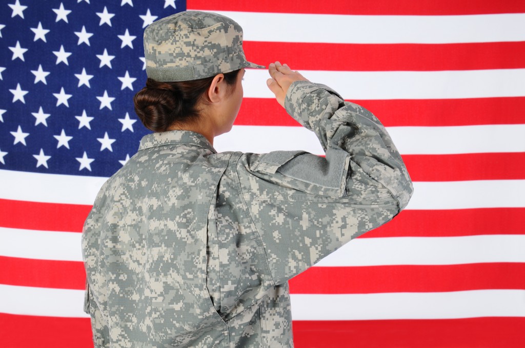 Female Soldier Saluting Flag