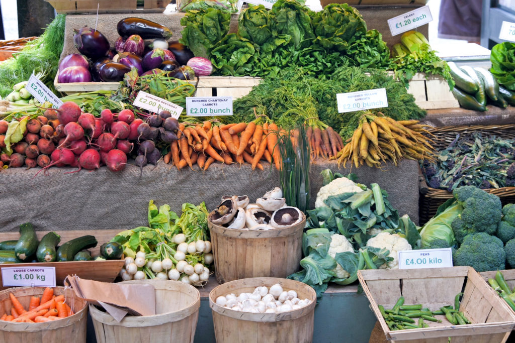 Green market place with lot of vegetables