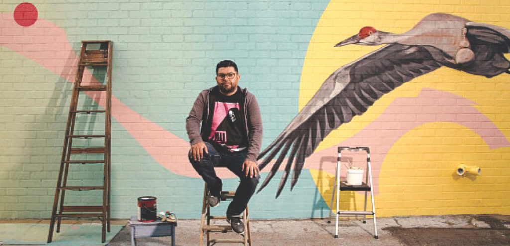 Un muralista latino demuestra con arte su apoyo contra el hambre infantil
